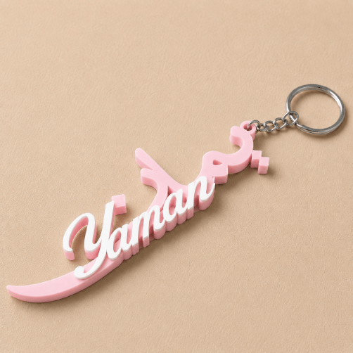 Customized Arabic and English name charm- light pink & white, personalized with your chosen name in an elegant bilingual design, perfect for adding a unique personal touch to your accessories or as a thoughtful gift.
