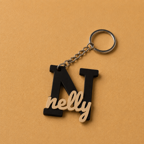 Customized name medals featuring each customer’s name and initial, creating a unique personalized accessory designed especially for them, Black & Ivory.