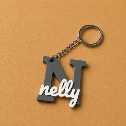 Customized name medals featuring each customer’s name and initial, creating a unique personalized accessory designed especially for them, dark grey and white