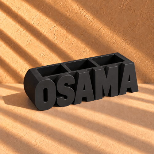 Customized Black 3D-printed name pen holder, personalized with your chosen name in English, perfect for a desk or office.  