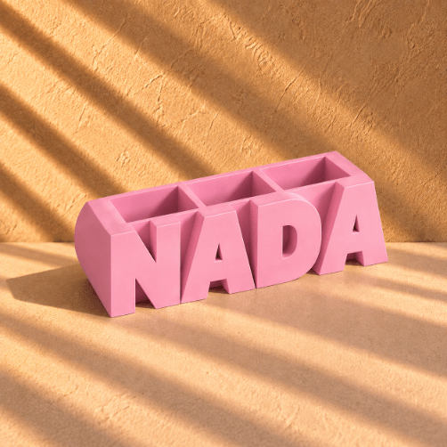 Customized light pink 3D-printed name pen holder, personalized with your chosen name in English, perfect for a desk or office.  