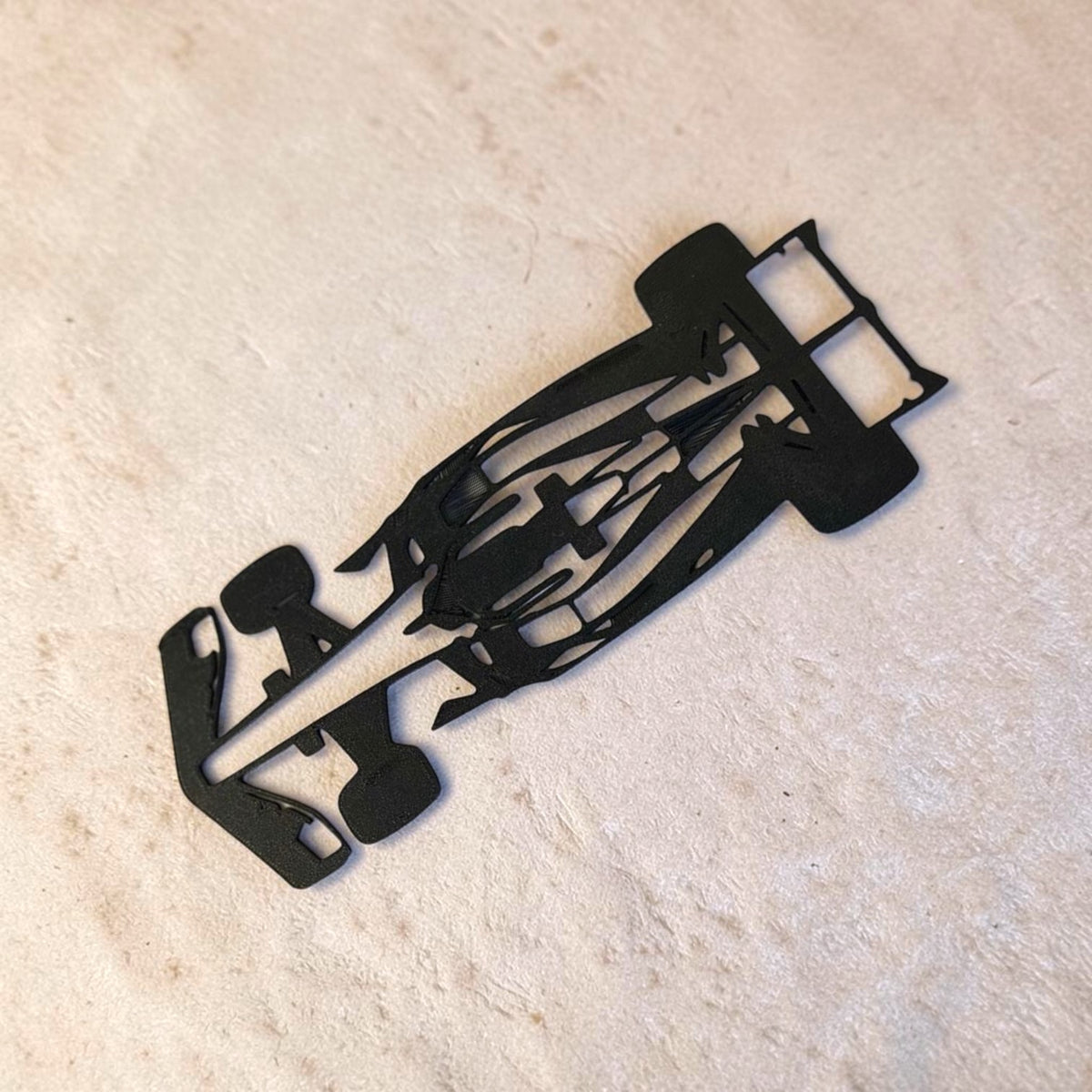 Formula 1 wall décor featuring a sleek racing-inspired design, perfect for F1 fans and adding a sporty, modern touch to any room.
