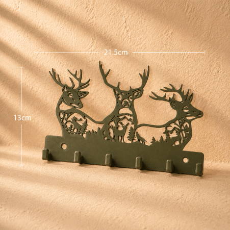 Deer-shaped keychain holder featuring a decorative design for neatly organizing and displaying keys, combining practical storage with stylish home décor.