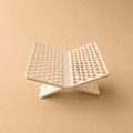 Elegant Quran stand designed to securely hold the Holy Quran, combining functional support with a refined decorative design for prayer and reading spaces.