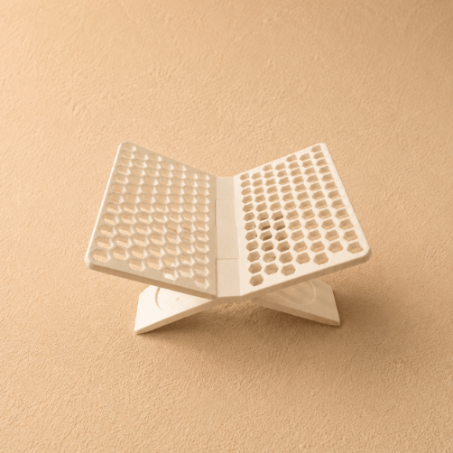 Elegant Quran stand designed to securely hold the Holy Quran, combining functional support with a refined decorative design for prayer and reading spaces.
