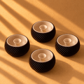 Mini Shell & Seed 3D-printed bowl in Brown and ivory, featuring a textured shell-inspired exterior and a small raised seed-shaped center, styled as elegant home décor.
