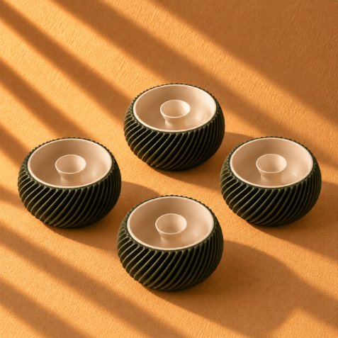  Mini Shell & Seed 3D-printed bowl in olive green and ivory, featuring a textured shell-inspired exterior and a small raised seed-shaped center, styled as elegant home décor.
