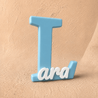 Personalized initial L name display with the custom name Lara, 3D printed in premium Light Blue and matte beige PLA for personalized home décor and gifting.