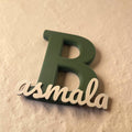Personalized initial B name display with the custom name Basmala, 3D printed in premium Olive Green and matte beige PLA for personalized home décor and gifting.
