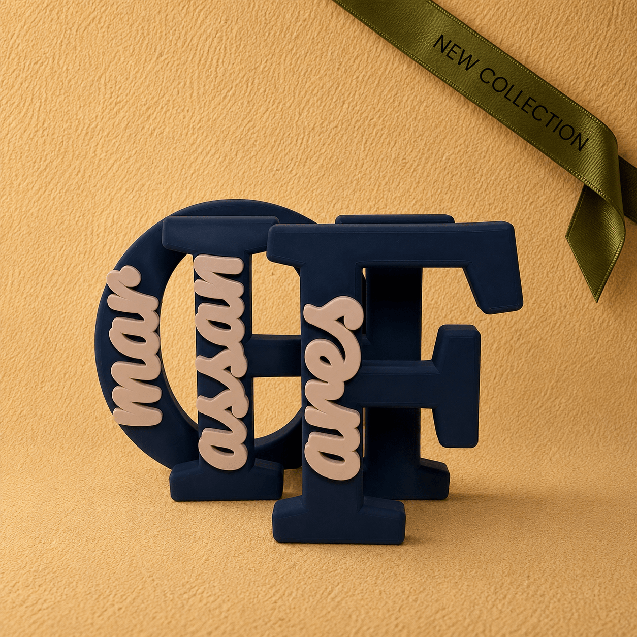 Three personalized 3D printed initial name displays in navy blue and matte beige PLA - front view-, featuring custom script names attached to large initials. Perfect as personalized home décor or a unique custom gift.