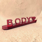 Personalized 3D printed name sign featuring the custom name Body with a heart accent, crafted in premium burgundy PLA. Freestanding custom desk name plate and personalized gift for couples, bedrooms, offices, and home décor.