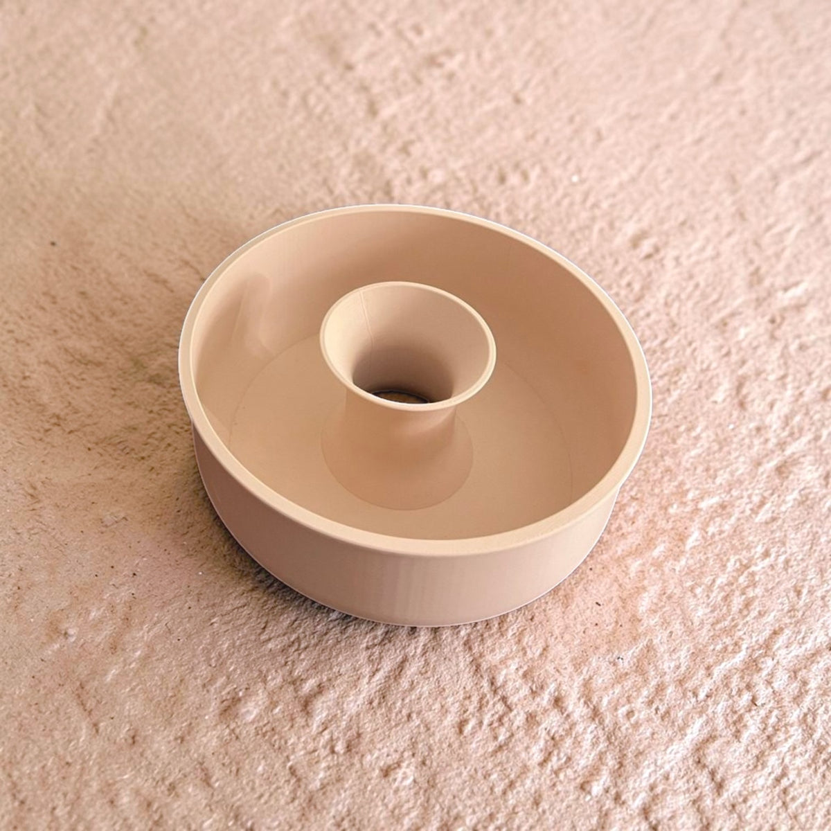 Shell & Seed snack bowl featuring a unique spiral outer-edge design, perfect for serving seeds, nuts, and other snacks while keeping shells and waste neatly separated.